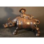 Chinese sculpture of a water buffalo with young boy; dark Yixing ceramic; Qing Dynasty. height 33cm,