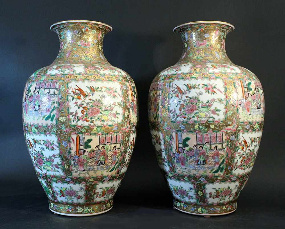 Pair of Chinese porcelain vases, white ground and multicoloured and golden decorations, glazed;