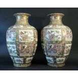 Pair of Chinese porcelain vases, white ground and multicoloured and golden decorations, glazed;