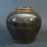 Chinese porcelain round pot, with black flambée glaze; short stepped neck; Qing Dynasty. height