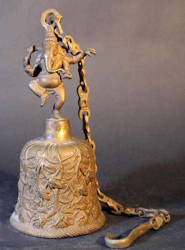 Tibetian metal round bell with dark patina; with floral decorations; on the top a dancing Ganesha - Image 2 of 3