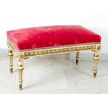 A small classical Italian bench on four turned and fluted feet, rectangular shape, with rich