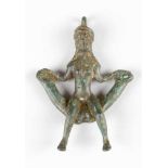 Erotic bronze amulet in Ancient manner shwoing a lady sitting on a bowed seat, on top a ring; full