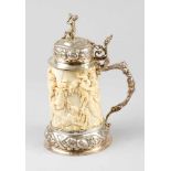 An ivory silver mounted tankard, with finely sculpted allegory of Centaur and classical figures;