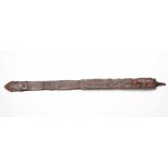 A Celtic or Medieval iron sword with parts of the sheath rusty; hand protection and grip missing;