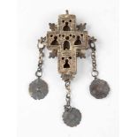 Wooden reliquiary (possibly part of the Holy Cross) in a silver container in form of a cross, with