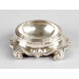 An Augsburg silver salt bowl with curved base decorated with volutes and central bowl, partly