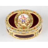 A French gold and enamel snuff box with two colour gold, oval shape with one lid; the top with