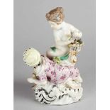 A porcelain group with two child symbolizing spring time and winter, on naturalistic formed base,