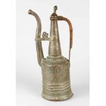 An Ottoman or Black Sea region coffee pot with long neck and spout, lid with hand grip; copper