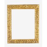 Impressive frame in manieristic manner, wood carved on waved border, decorated with floral