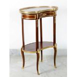 A very fine small Belle-Epoque table, on four shaped feet with lower top and upper section with