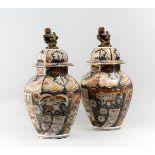 PAIR OF XVIII CENTURY IMARI VASES AND COVER EDO PERIOD