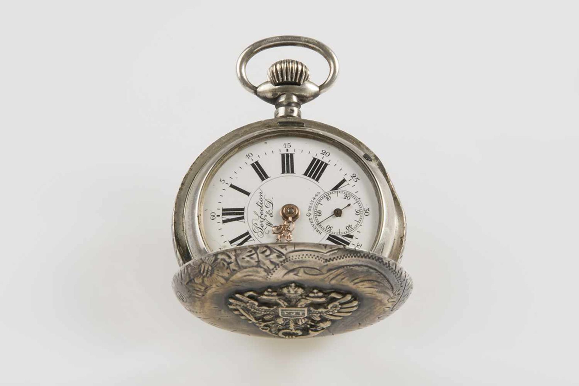 Doppelmanteltaschenuhr Metall mit Springdeckel (Doppeladlerwappen mit Posthorn), Marke Brevet