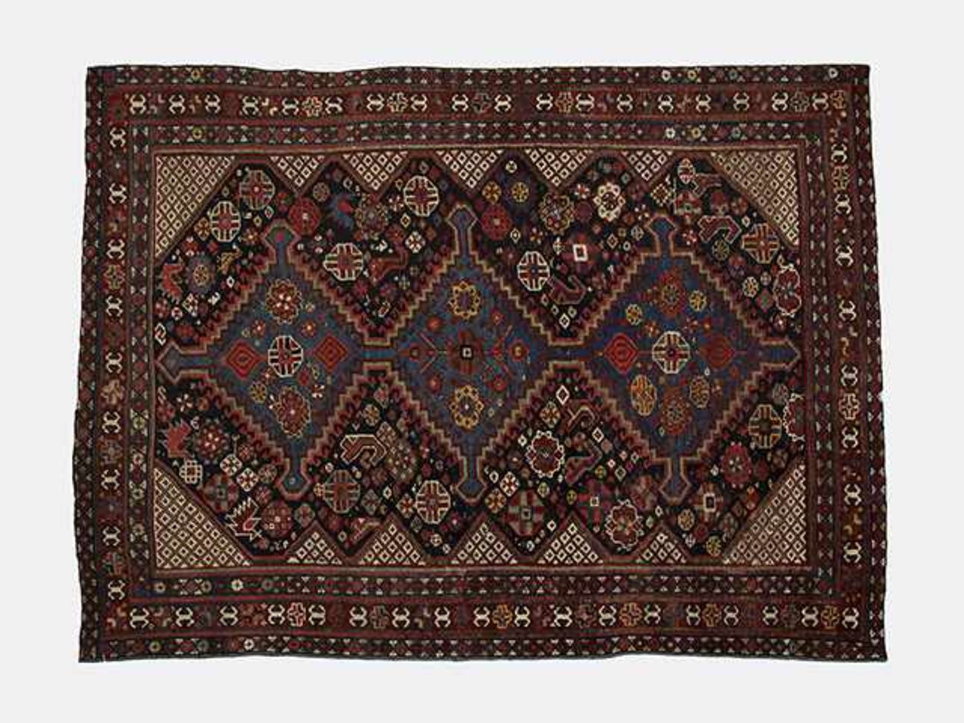 Perser-Teppich 1.Hälfte 20.Jh., Fond mit 3 Medaillons, mit Blütenfüllungen, 3 Bordüren, etwas