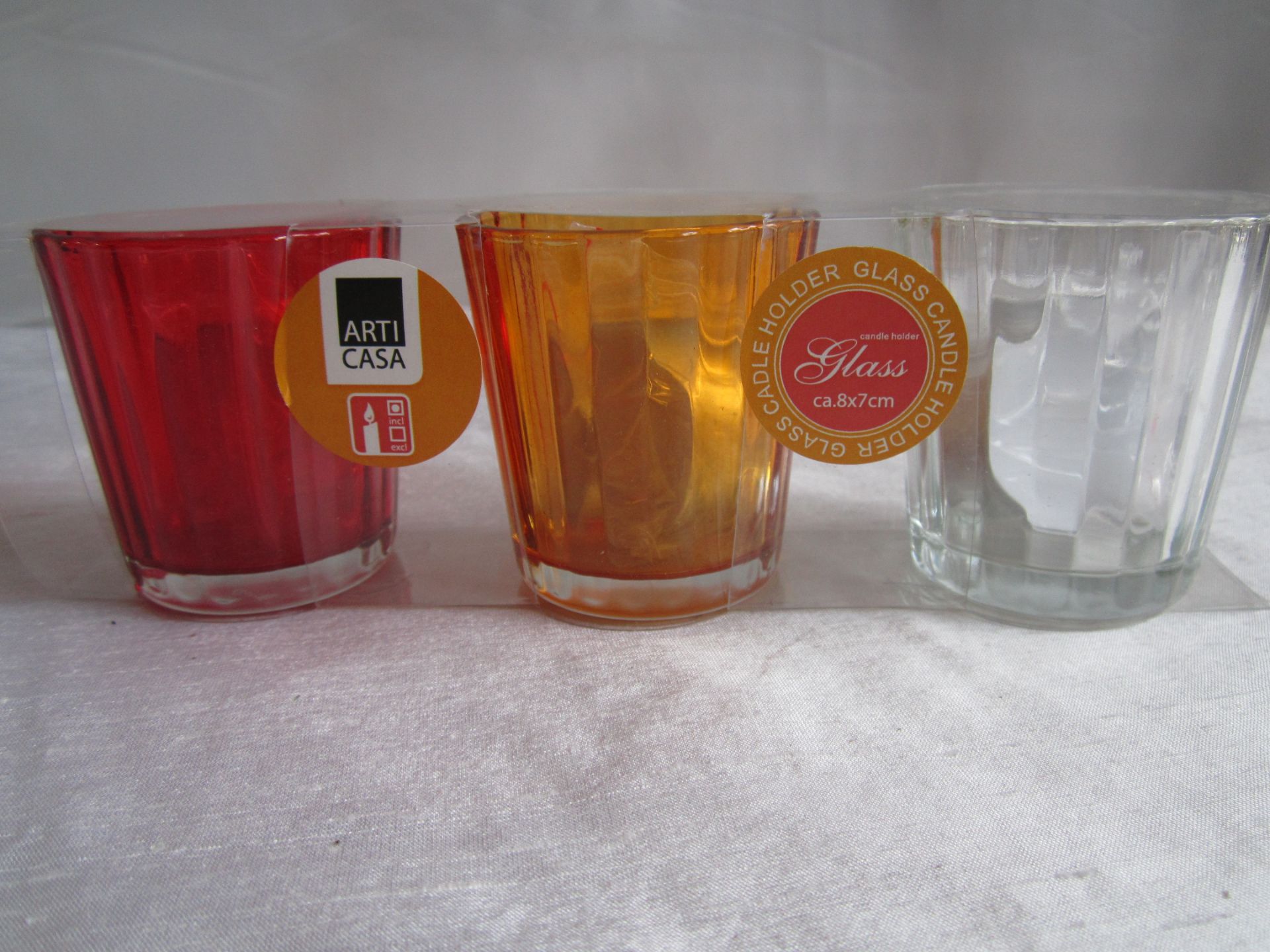 36 x Various Coloured glass tea light holders (Delivery Available)