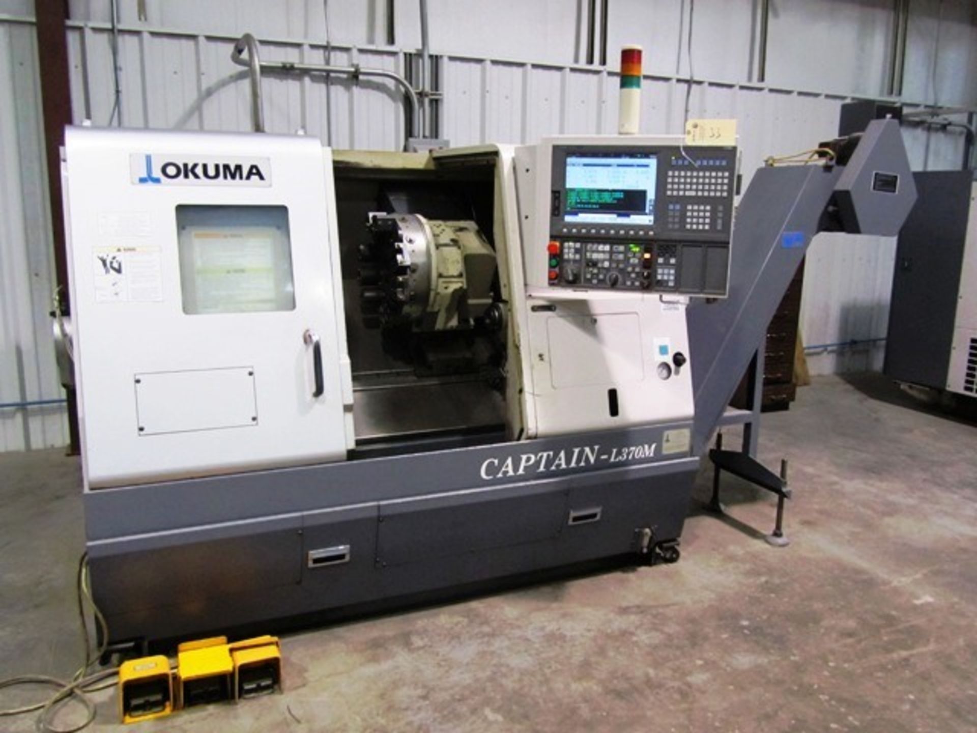 Okuma Model Captain L370M CNC Turning Center with Milling, `C' Axis, 12 Station Turret, Collet