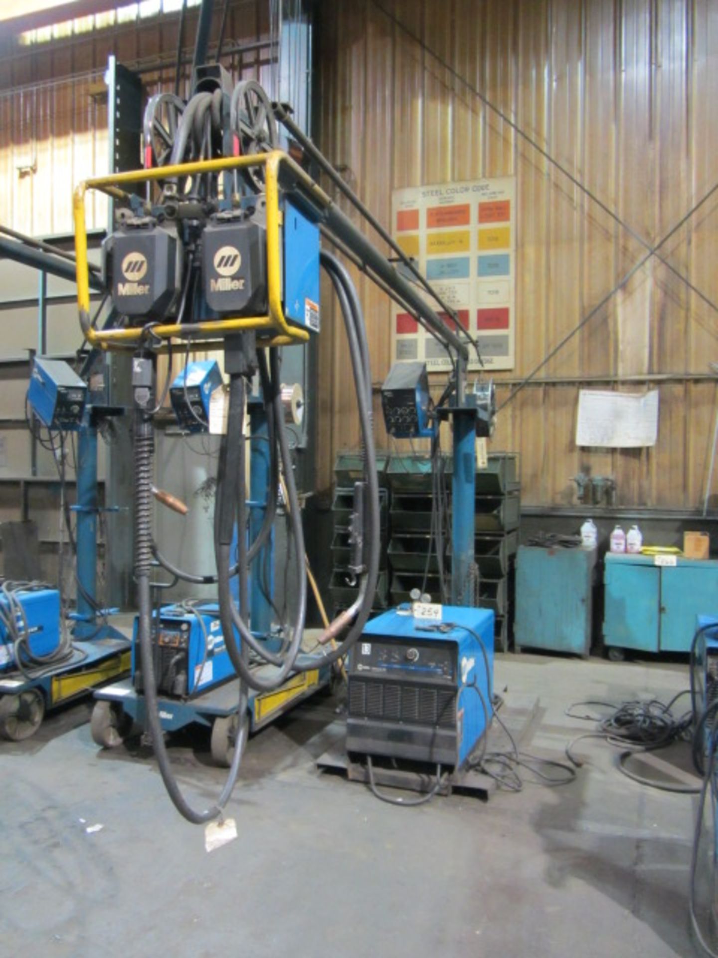 Miller Deltaweld 452 Welder with Boom & Miller 60 Series Wire Feeder, sn:LA252504