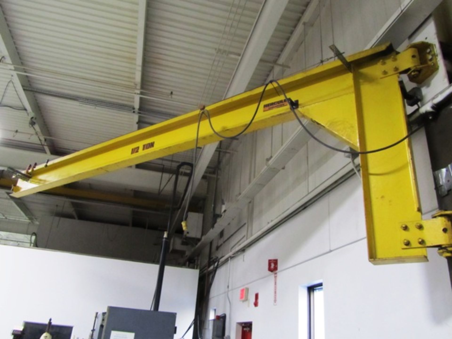 1/2 Ton Jib (on wall) with 1/2 Ton CM Electric Hoist with Pendant Control (on floor)