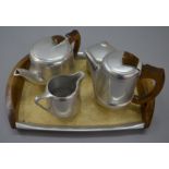 A 5 piece Picquot Ware set including tra, teapot,