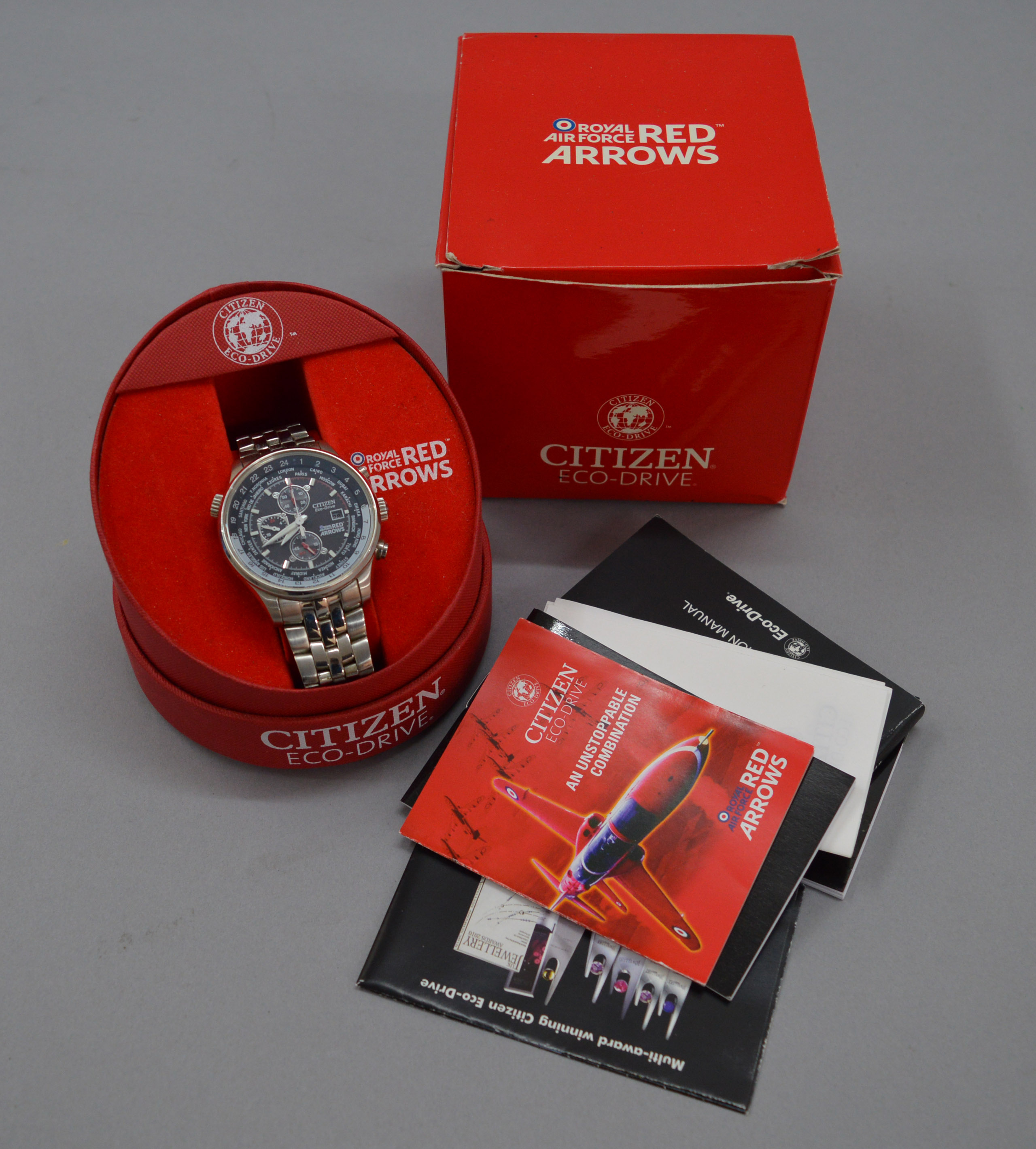 A Citizen Eco Drive Red Arrows steel cased wrist watch with box.