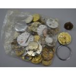 Qty. of pocket watch spares including faces and movements.