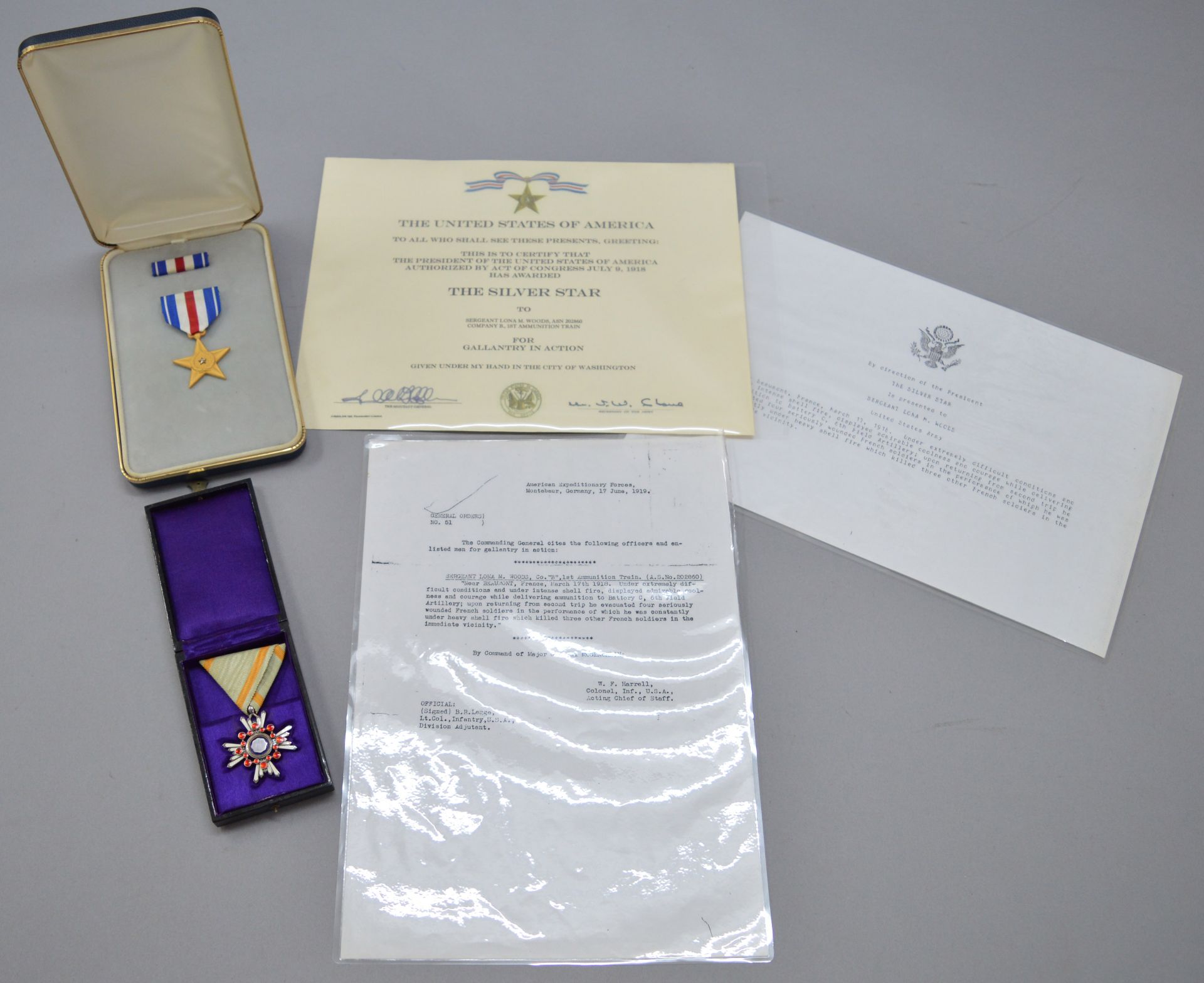 A Japanese 'Order of the Sacred Treasure' boxed medal together with a boxed USA star "For Gallantry