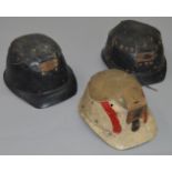 3 vintage mining helmets