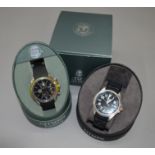 2 Citizen Eco Drive wristwatches with 2 boxes.