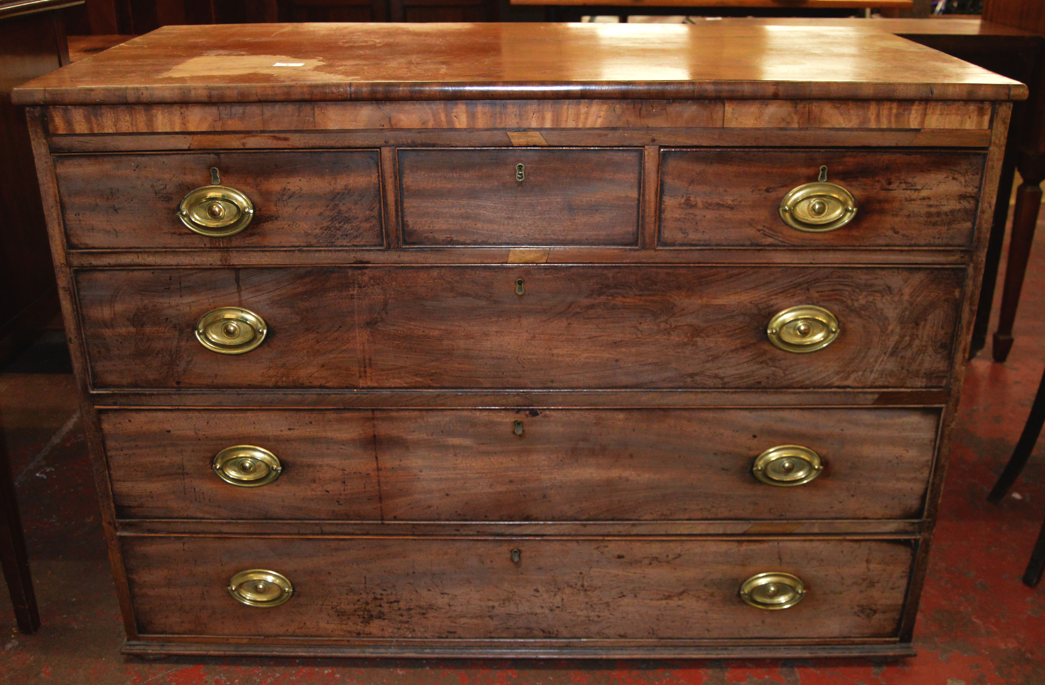 An early Victorian mahogany chest of 3 over 3 drawers.