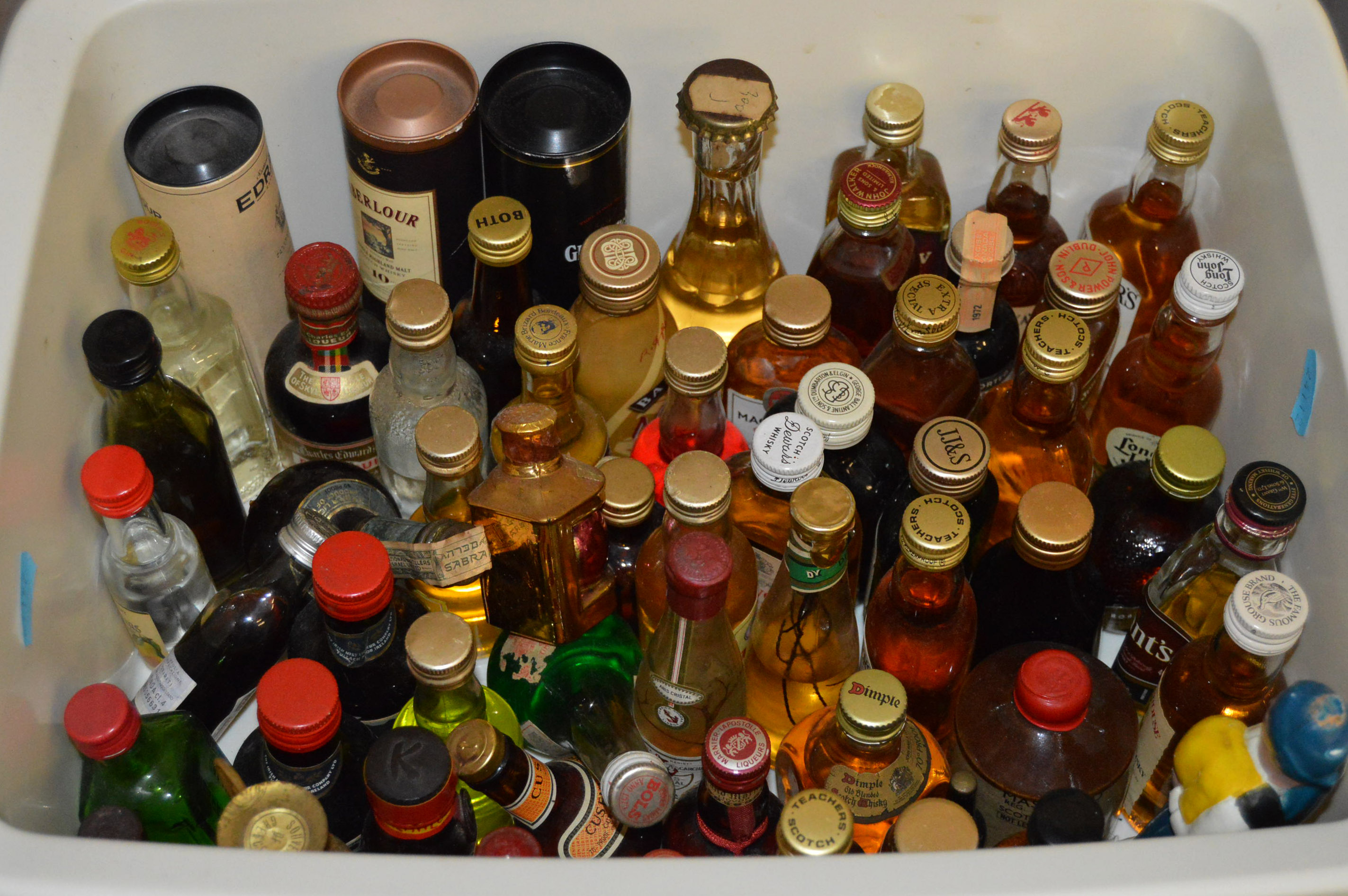 Approx 200 spirit miniatures including whiskeys,