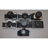 7 Minolta and other SLR cameras. Ti include X300, X700 etc, most with lenses.
