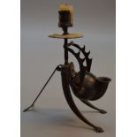 A candlestick and inkwell desk stand in the form of a snail