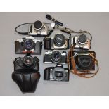 Good, mixed lot of 35mm cameras including Canon, Nikon, Praktica etc,