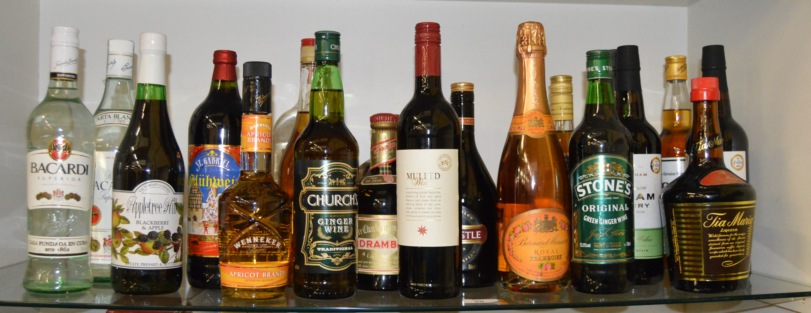 A large quantity of assorted alcohol including spirits and liqueurs.