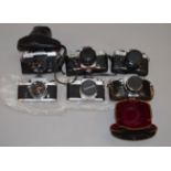 6 Japanese 35mm SLR cameras, including Miranda, Fuji etc. All with lenses.