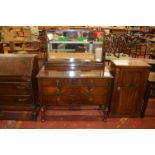 An Edwardian flame mahogany dressing table with mirror.