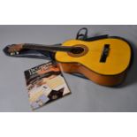 A Lorenzo acoustic guitar with case