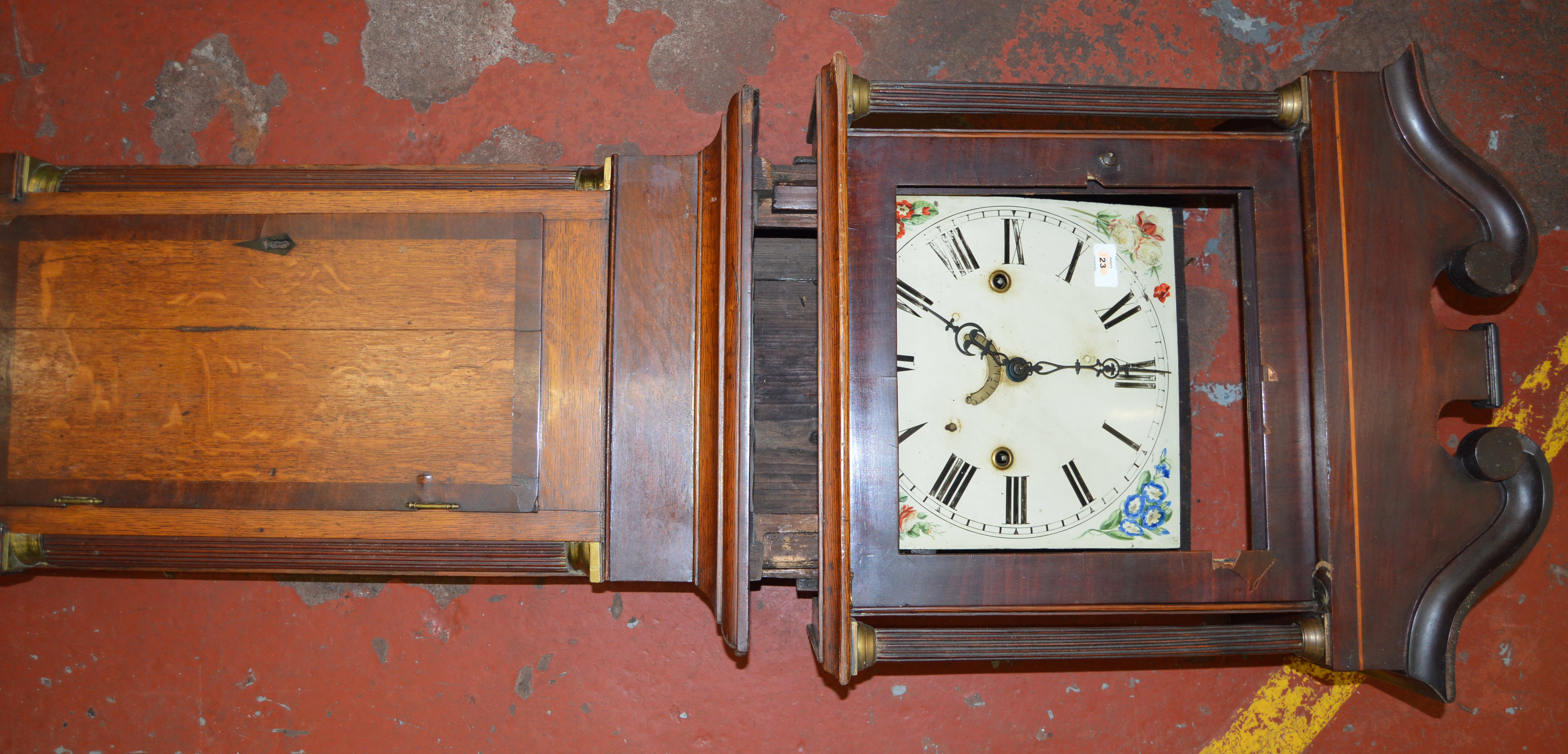 A grandfather clock (AF) with weights and pendulum