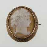 A Victorian oval cameo brooch with finely carved shell & engraved frame, 36mm high & approx 5.