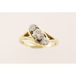 An 18ct three stone diamond ring totalling approx 0.80cts & 3.