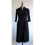 A 1940s CC41 Utility Black rayon crepe dress labelled A Frederick Gown.