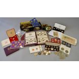 A boxed quantity of assorted coins including Victorian double florins, Georgian half-crowns,