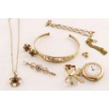 A quantity of 9ct & yellow metal items to include a stone set bangle , bar brooch,