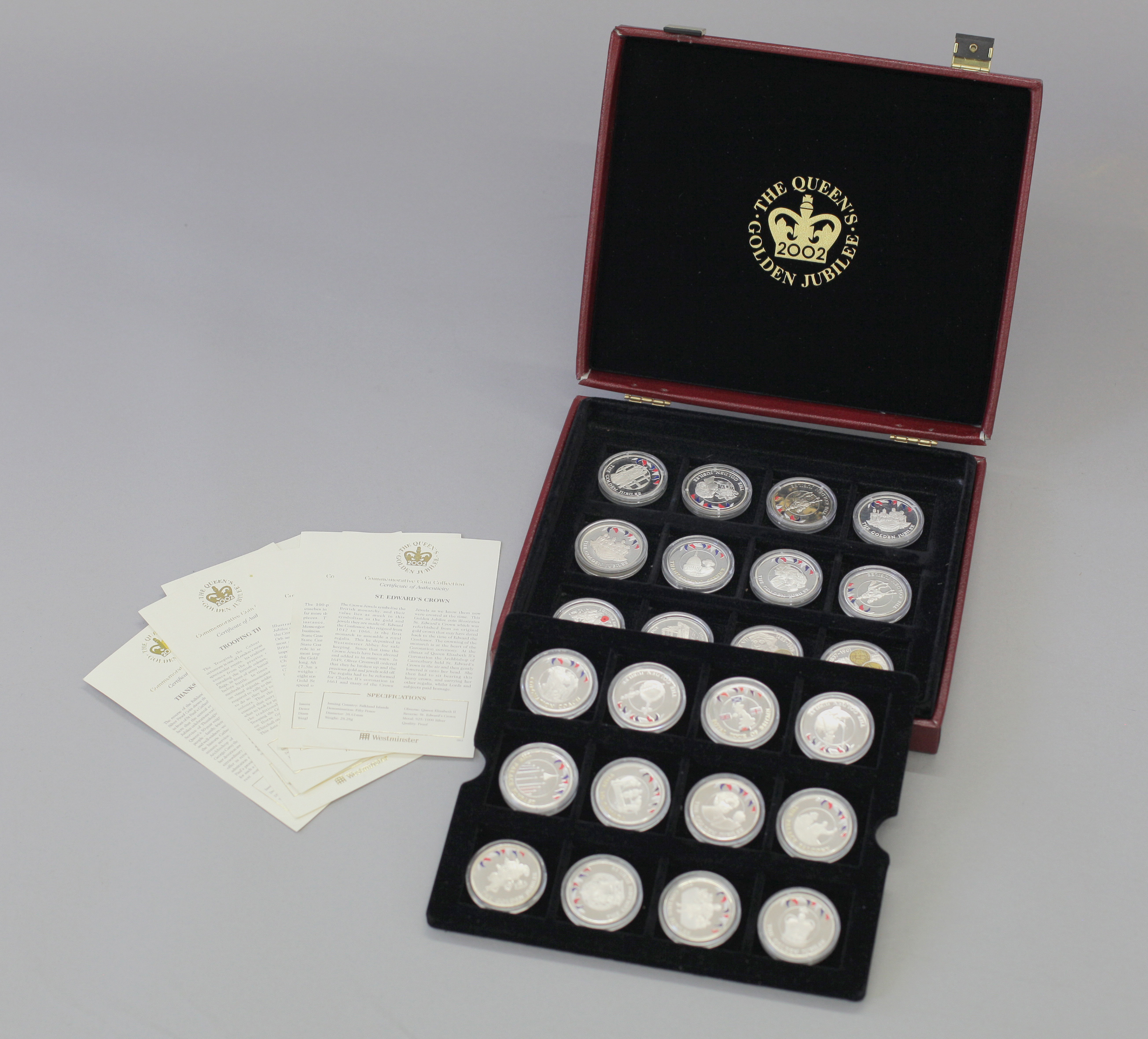 A cased quantity of Queens Golden Jubilee & other commemorative coins,