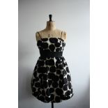 A Juicy Couture summer dress in oversize black polka dots and cream silk,