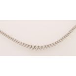 An 18ct white gold diamond set collar necklace, with approx 4.