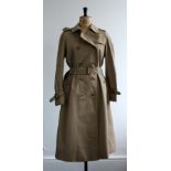 1970s Ladies Burberry trench coat in classic biege with nova check lining.