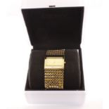 A ladies gold plated DKNY bracelet wristwatch with original box & papers dated 2005