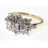 An diamond cluster ring, marked 14-18k, approx total diamond weight 1.